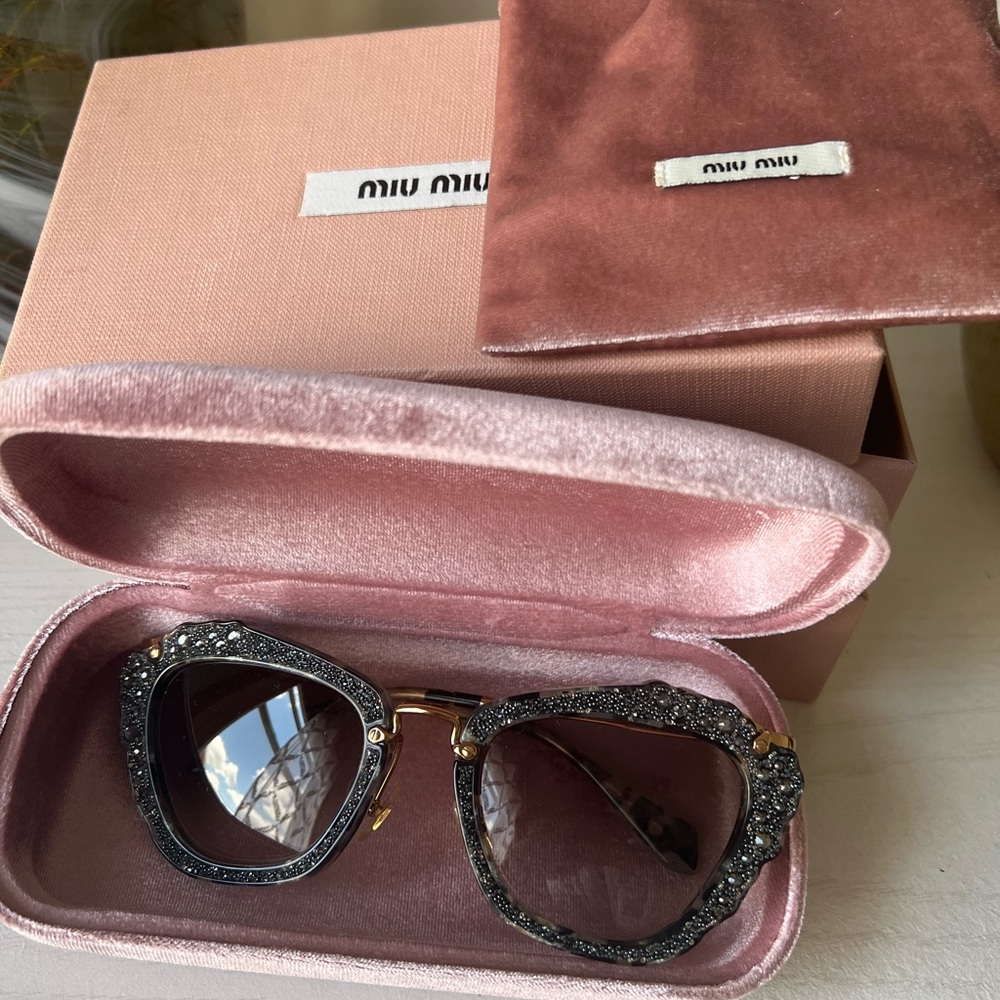 Miu Miu Black and Gold Fashion Sunglasses